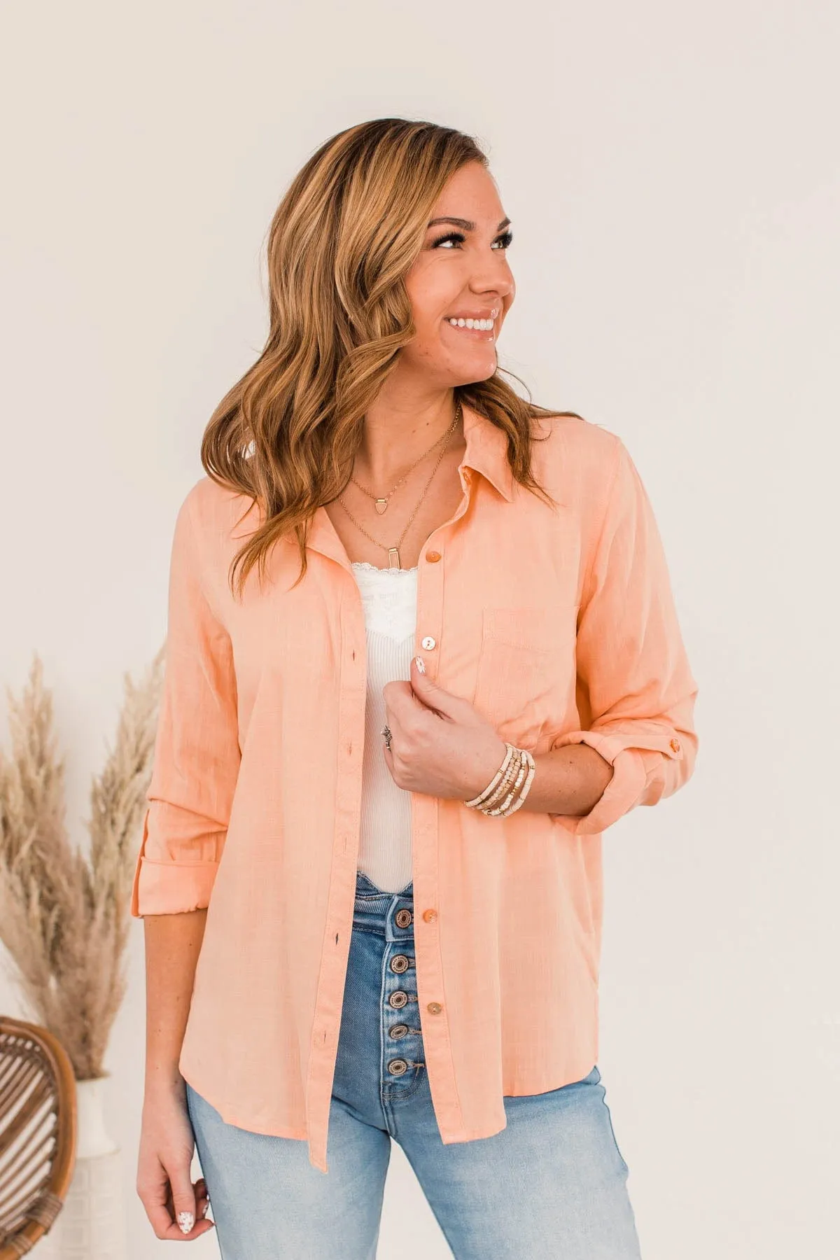 Hearing The Love Button Pocket Top- Cantaloupe