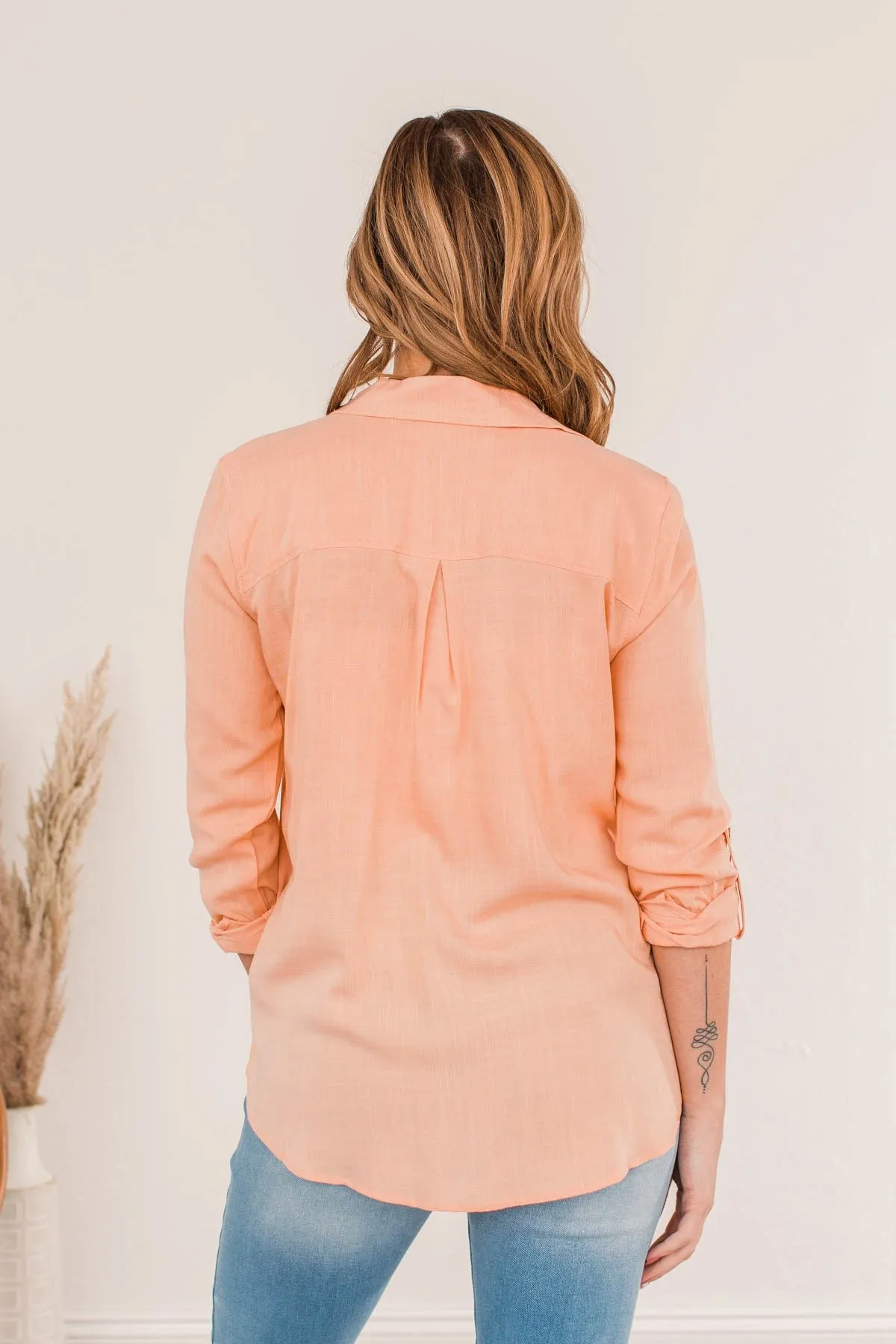 Hearing The Love Button Pocket Top- Cantaloupe